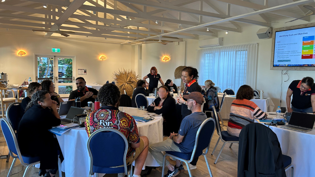 A group of people in AH&MRC having a workshop and working together